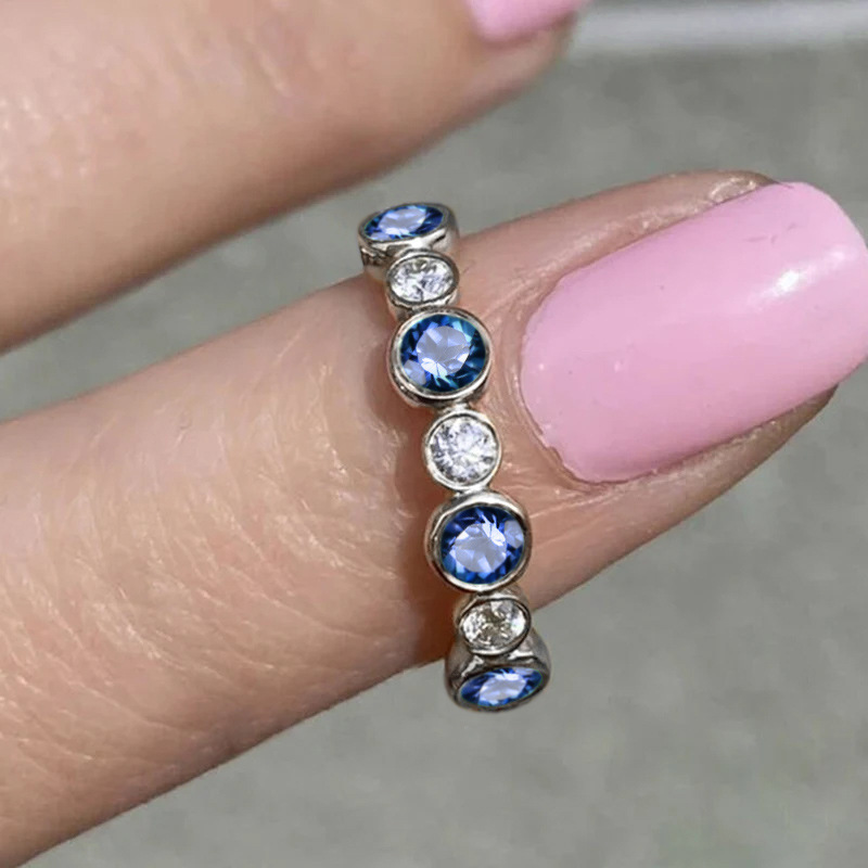 White gold + blue stone