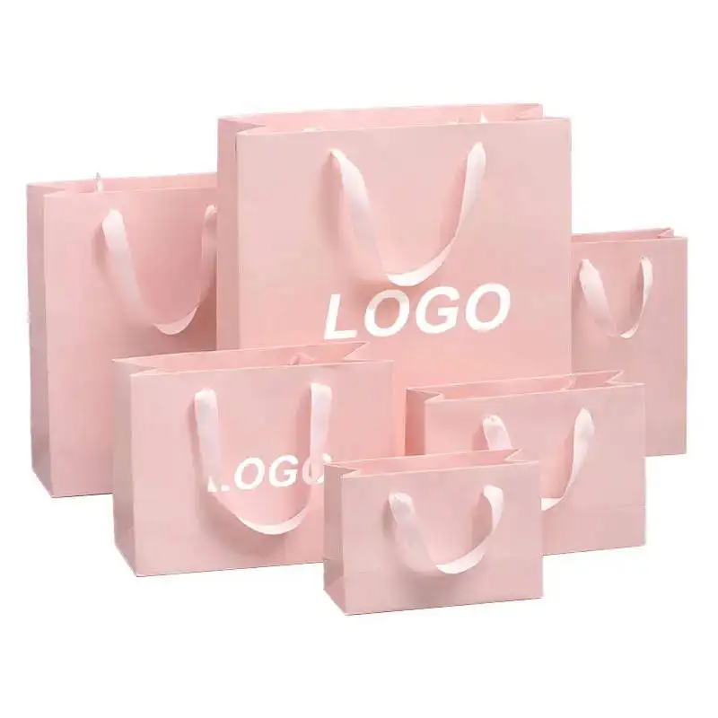 Lote pequeño personalizado respetuoso con el medio ambiente y reciclable portátil Rosa bolsas de papel Kraft con para ropa y zapatos