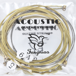 La fábrica de procesamiento al por mayor ofrece cuerdas de guitarra hechas de madera y nailon. El precio es muy razonable para un juego de 6 cuerdas. - Product Image 2