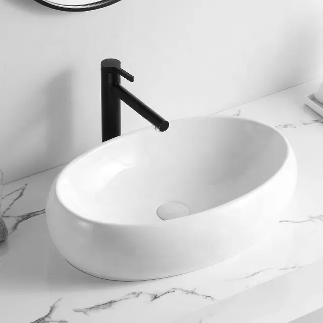 Modern üstü sayaç Oval lavabo seramik sert yüzeyli masa üstü lavabo banyo gemi lavabo