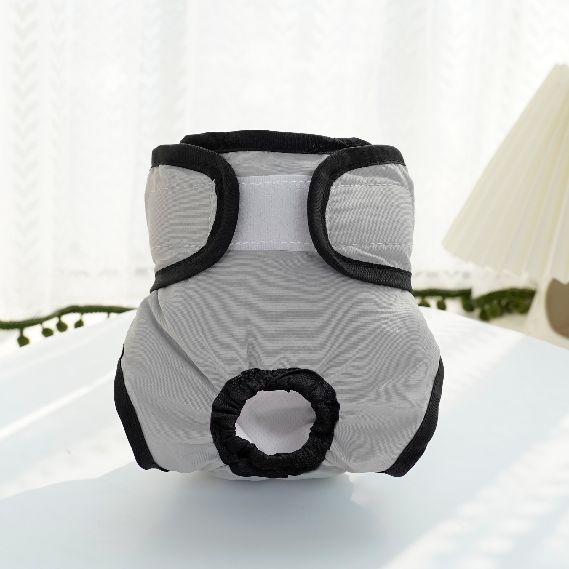 couche pour chien femelle grise
