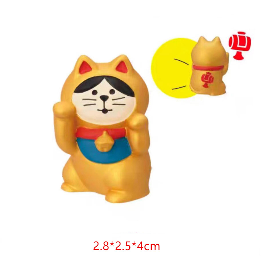 Chat doré chanceux