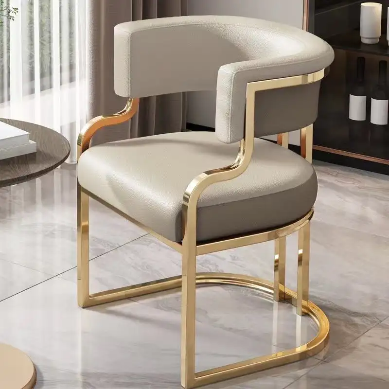 Sillas de sillón de comedor de cuero tapizadas de Metal dorado para visitantes de salón de café de lujo moderno a la venta