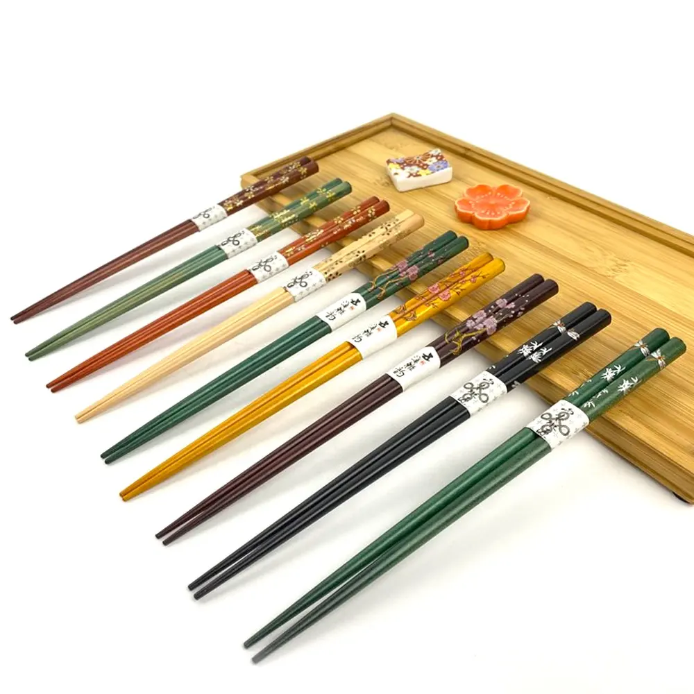 Benzersiz cila teknolojisi yeniden kullanılabilir ahşap chopstickler baskılı çizim özelleştirilmiş ambalaj logosu