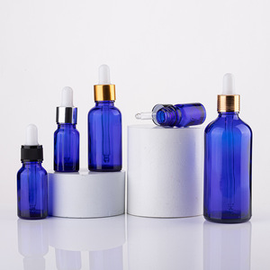 Venta al por mayor vacío 5ml 10ml 15ml 20ml 30ml 50ml 100ml Cuidado de la piel esencia botella de aceite esencial de vidrio negro con cuentagotas - Product Image 4