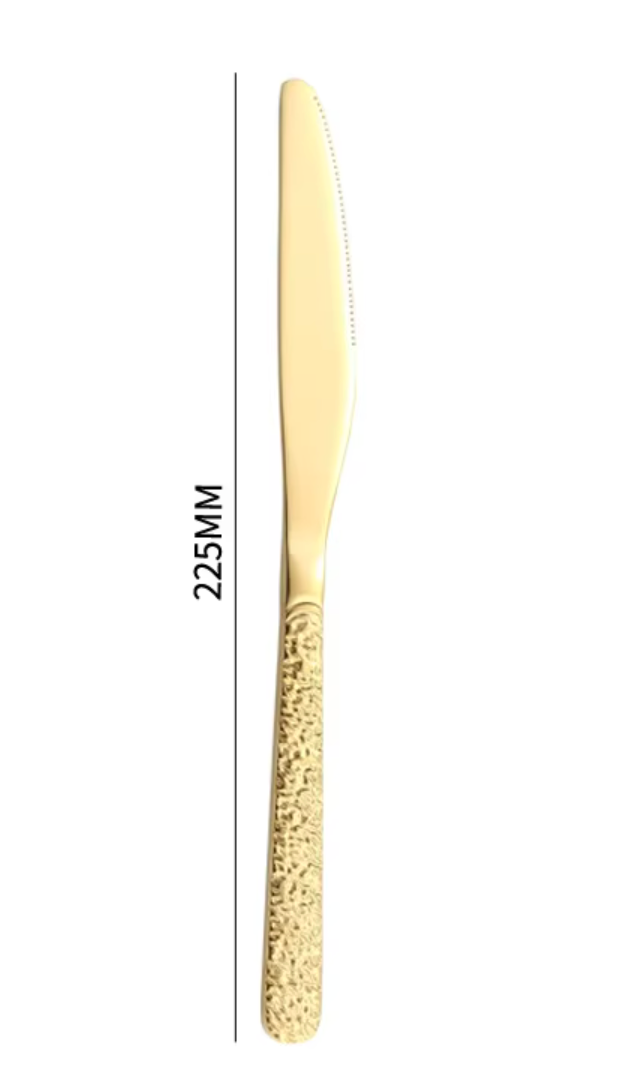 Gold--stone pattern dinner knife