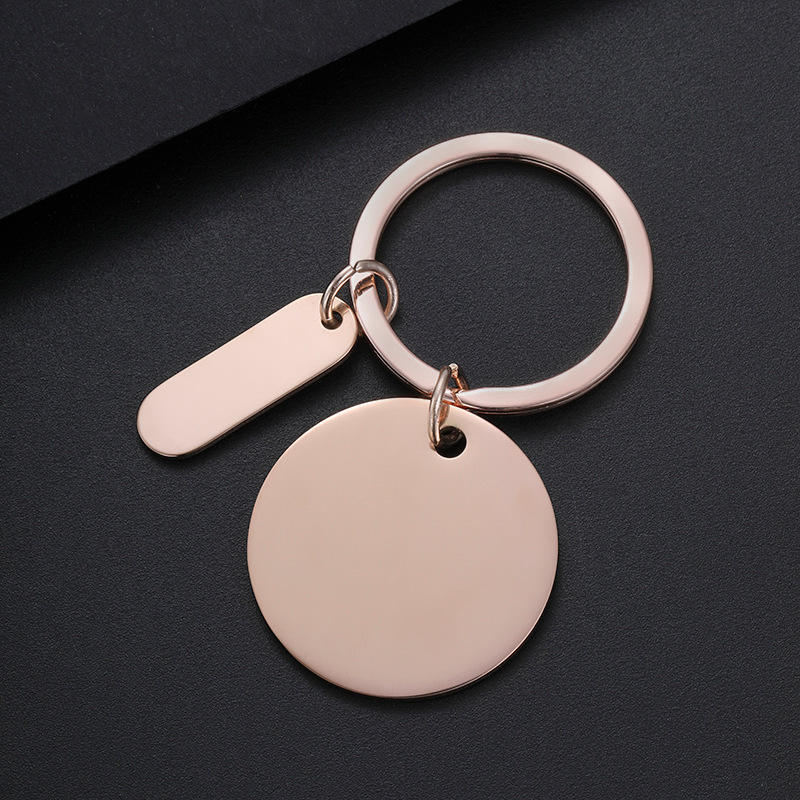 Juego de llaveros pequeños y alargados, redondos, con orificio interior de 30 mm - oro rosa.