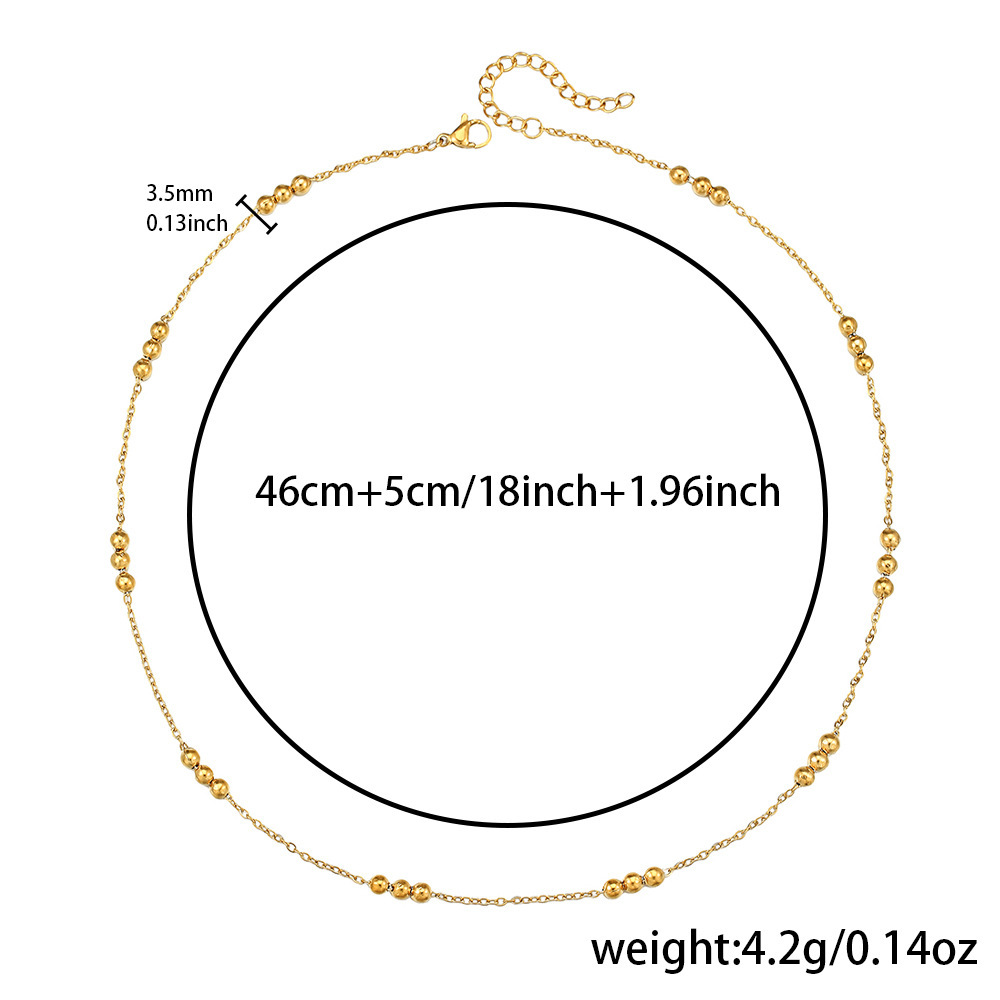 Collier Q0025-1 (croix martelée à trois perles de 0,4 mm)