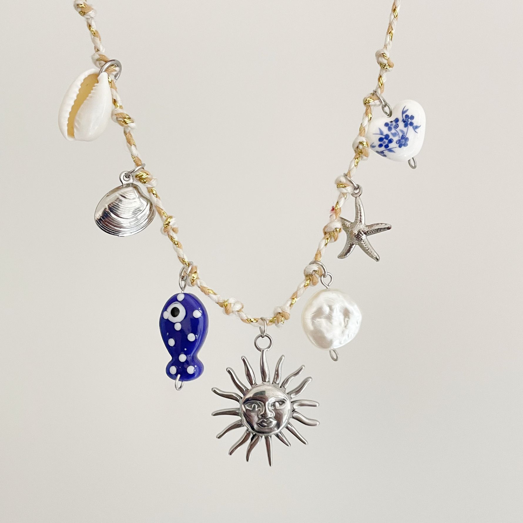 Collana sole in argento (bianco)