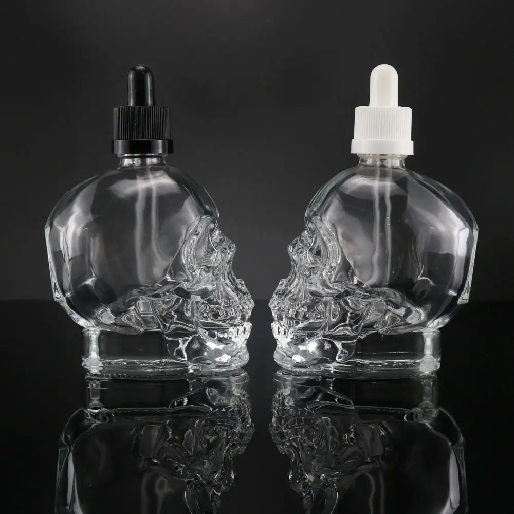 Parfum fantaisie 15ml 30ml 60ml fournisseur chinois crâne en forme de tête de mort en verre 1oz flacon compte-gouttes d'huile de barbe en verre pour récipient à vin