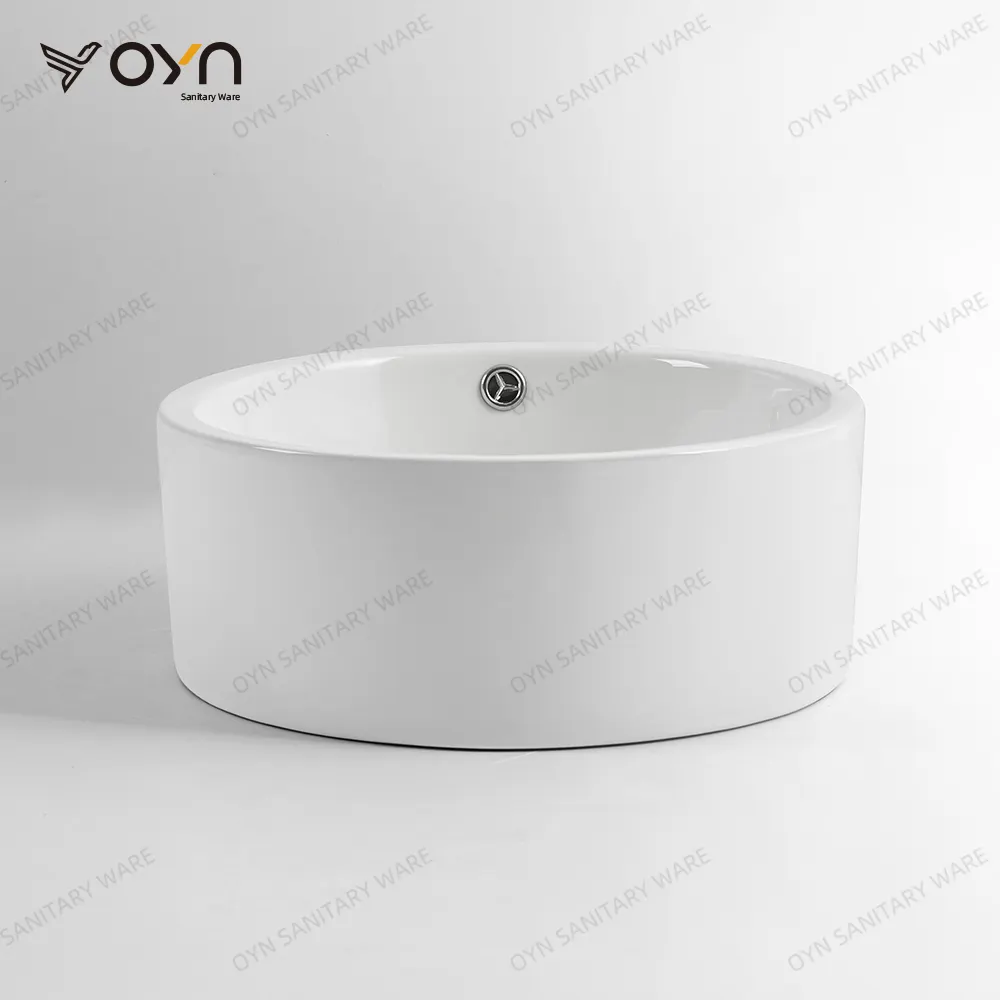 Lavabo de comptoir rond en quartz suspendu Lavabo en céramique au design moderne