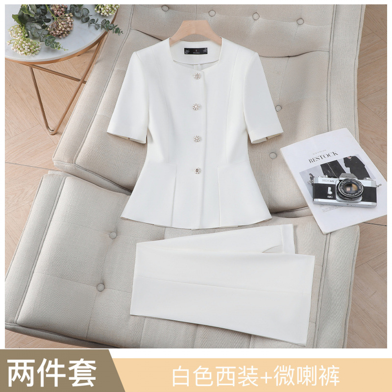 White suit with slightly flared trousers