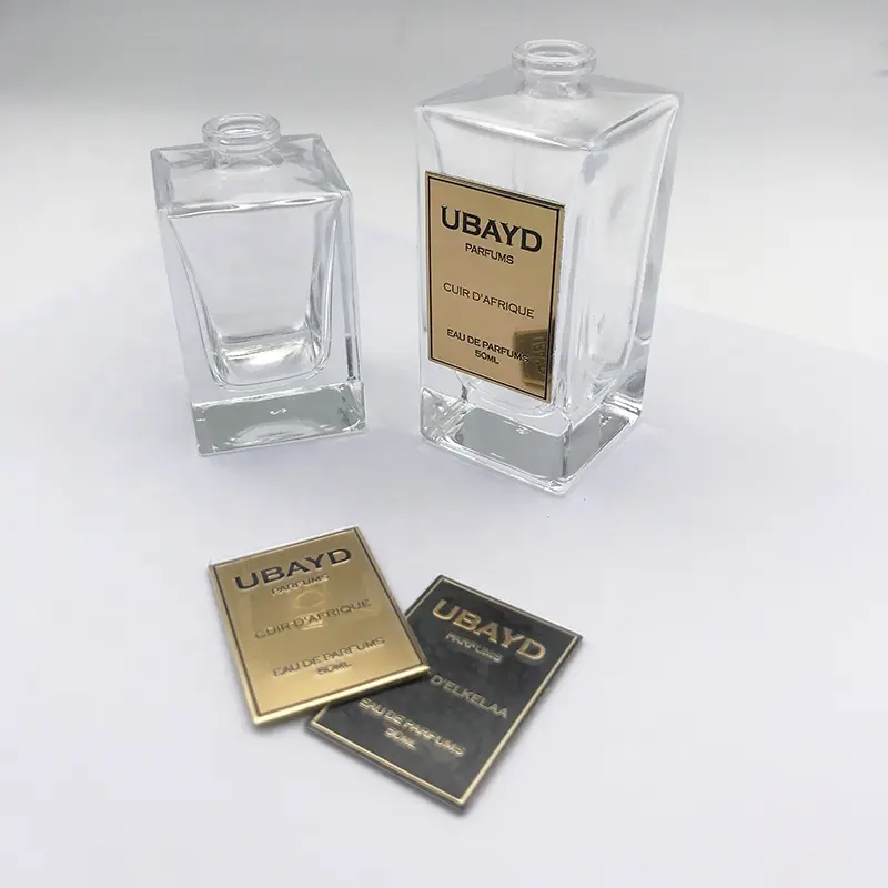 Etiquetas de metal personalizadas para perfume, etiquetas de metal con logotipo grabado