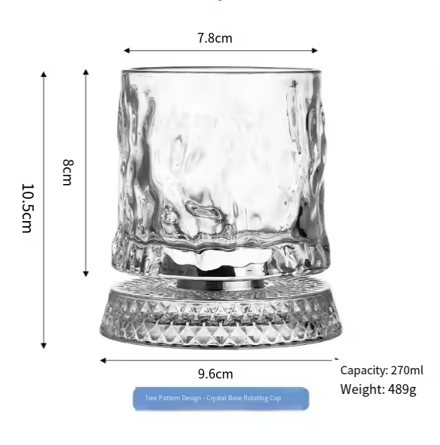 Taza giratoria con base de cristal y diseño de árbol.