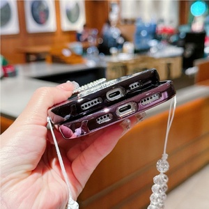 Yeni ürün elektroliz yumuşak TPU ayna el kayışı Glitter kızlar telefon kılıfı kapak iPhone 16 Pro Max