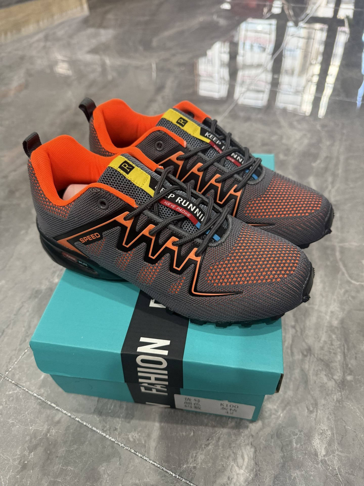 K100 gris-orange