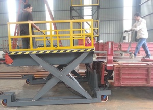 Precio de fábrica Contenedor Muelle Camión Plataforma de trabajo de carga y descarga Motor personalizado para motor de tijera móvil Mesa de motor