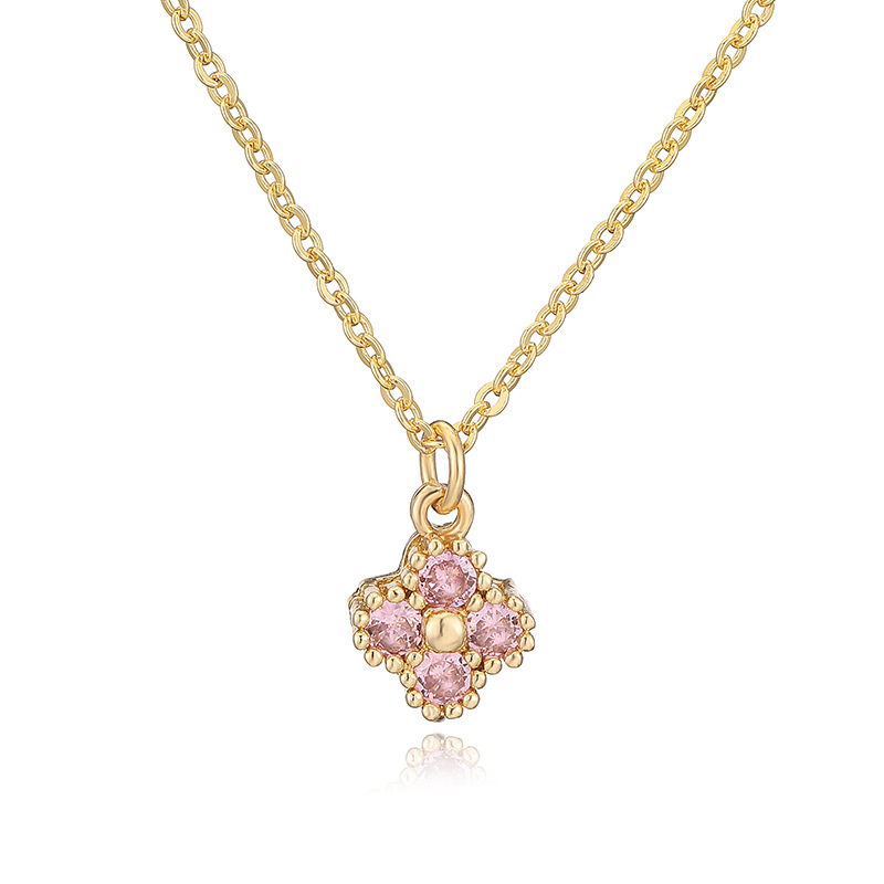 Collier trèfle à quatre feuilles en or rose et diamants, modèle "O".