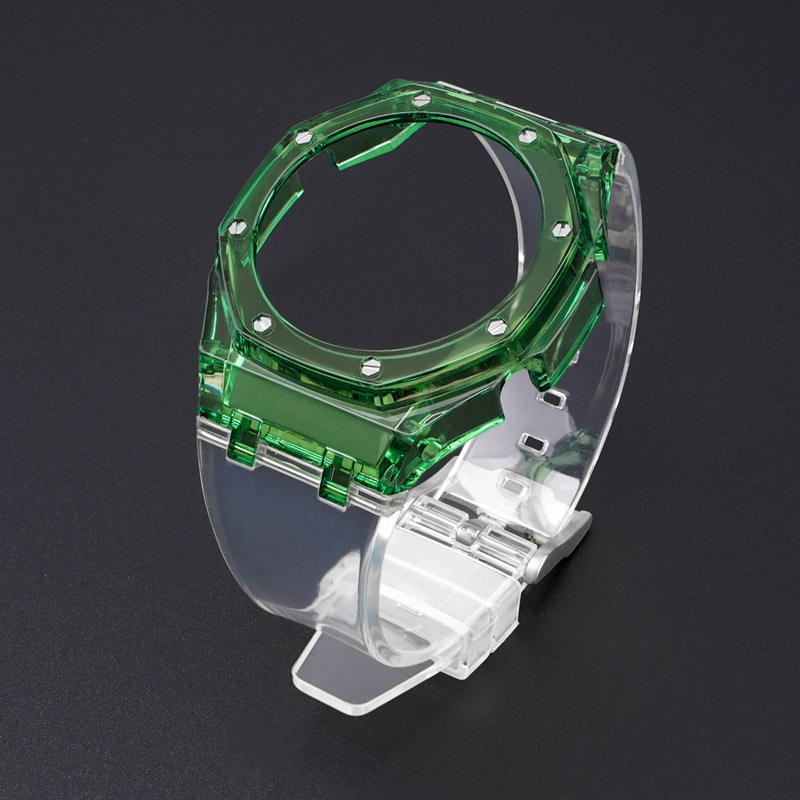 Caja verde esmeralda, correa transparente con herramientas.