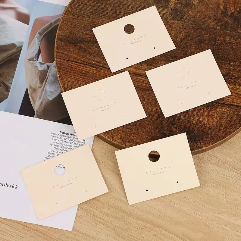 E-Wholesale nuova carta di imballaggio per gioielli per orecchini di doratura con piastra NYU produttori di cartone fai da te