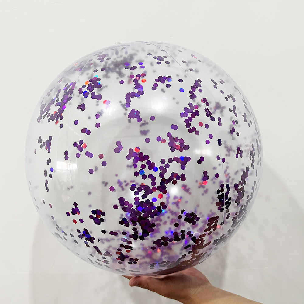 Pelota de playa de 30 cm con brillo púrpura encantador, después de inflar.