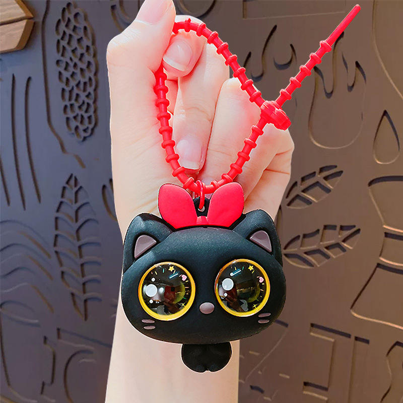 Pendentif musical pincé chat gros yeux-noir