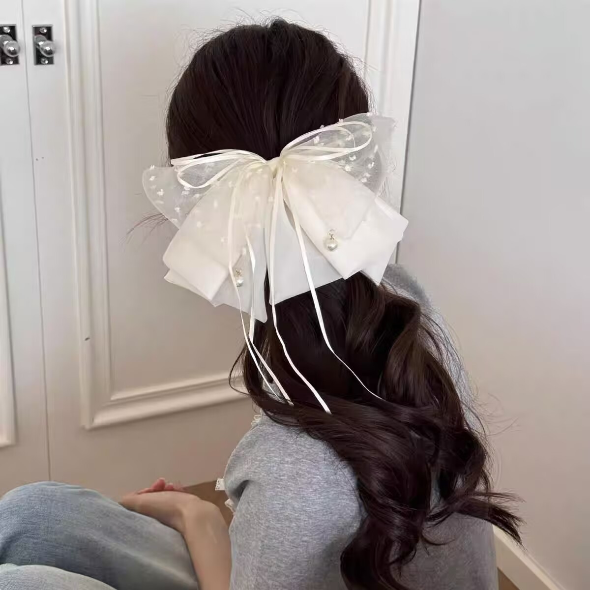 clip de suspension en maille blanche