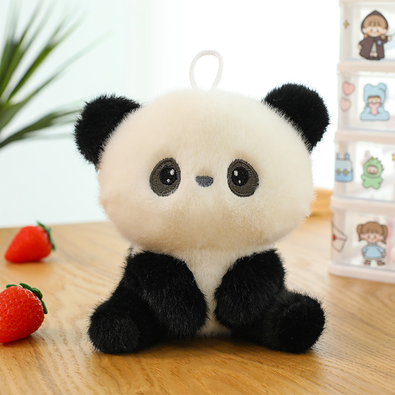 Compagno da tavolo bambola-panda rosso
