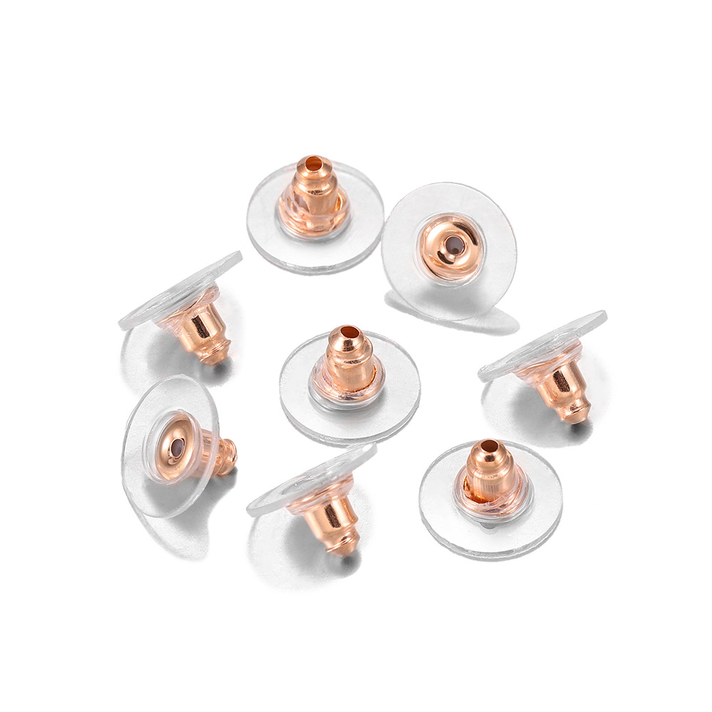 Auriculares con forma de OVNI, oro rosa