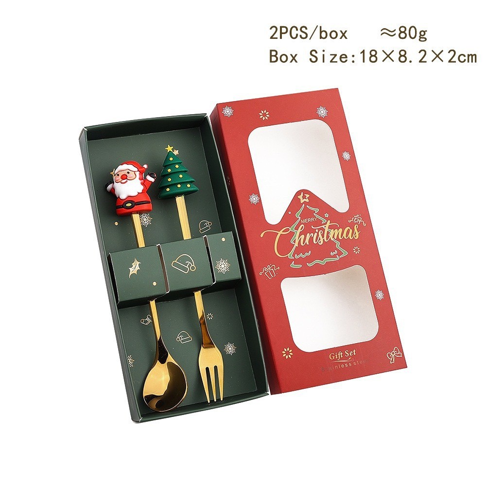 Ensemble de couverts dorés 2 pièces (cuillère et fourchette) - Boîte rouge motif Noël (Père Noël et sapin).