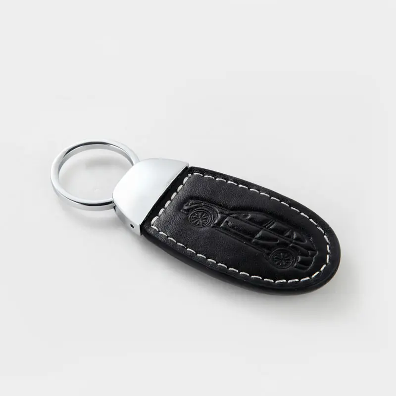 Porte-clés de voiture en cuir classique de luxe avec logo en relief de forme personnalisée de différentes marques de voitures Porte-clés en cuir avec emblème