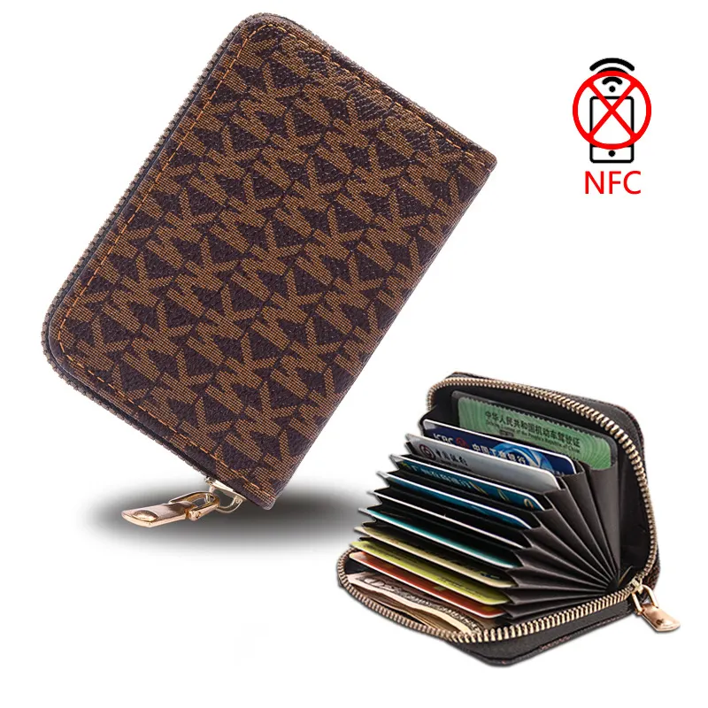 Nueva cartera informal vintage con cremallera corta para mujer, pequeño monedero encantador, billetera simple para mujer, fábrica de marea al por mayor