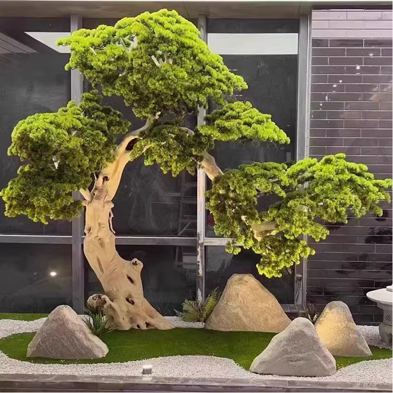 Árbol de 15 m de altura, 3 piedras de rocalla, raíz tallada en madera