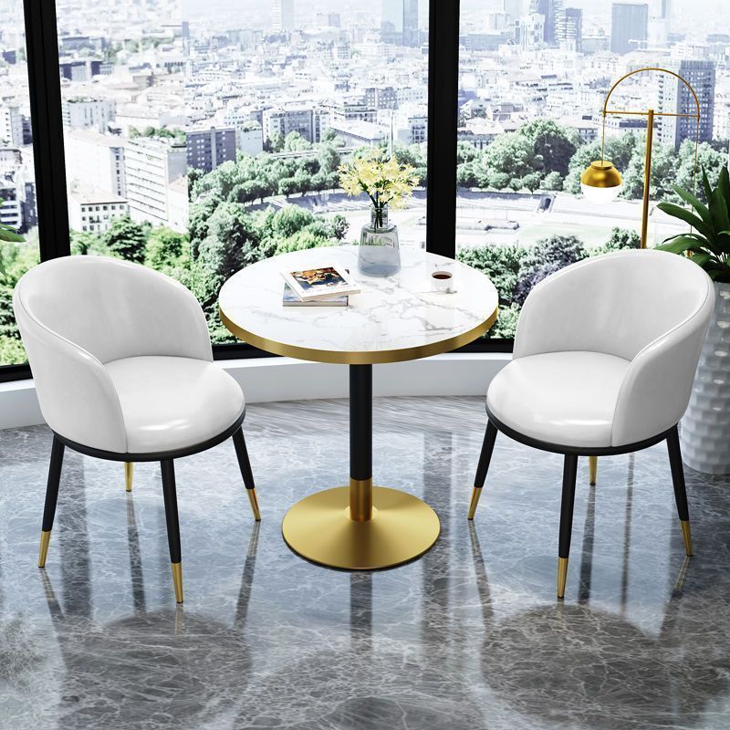 White leather chair imitation stone round table-