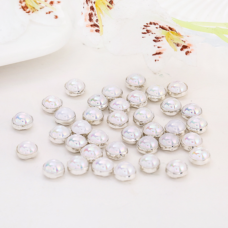 Silver base with white pearls