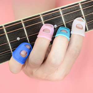 ギターフィンガーカバーフィンガーカバーアクセサリー多数の卸売左手ギターフィンガーカバーフラワーグルーフリップブック