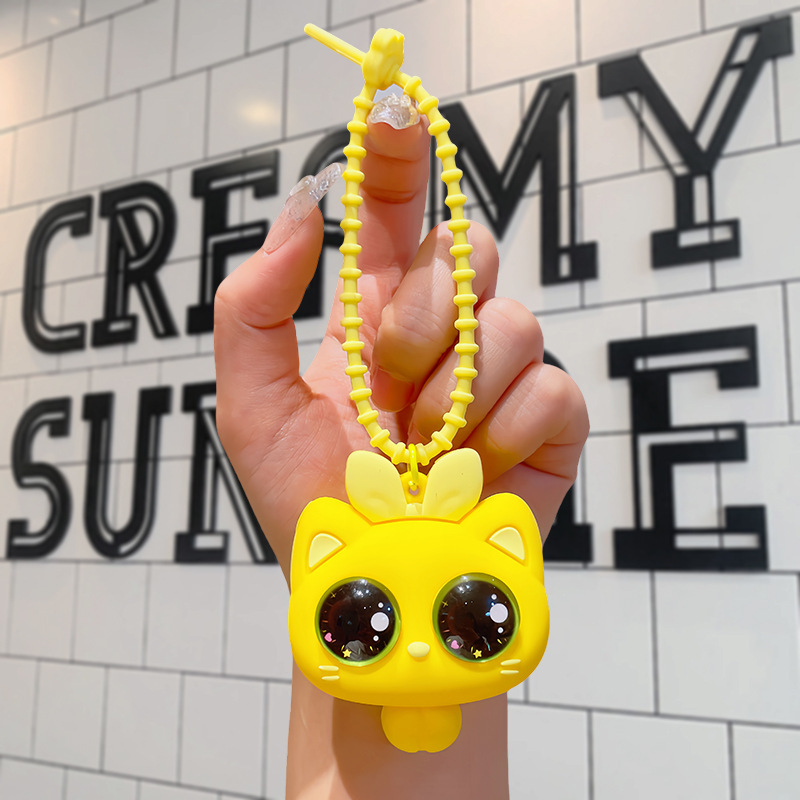Gato de ojos grandes Minky - Amarillo