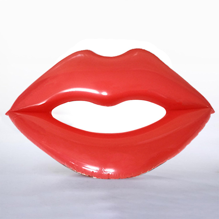 Bouée rouge en forme de lèvres - diamètre 180 cm après gonflage.