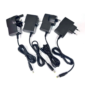 Chúng tôi EU Anh AU DC tường cắm sạc 3V 5V 6V 9V 12V 15V 24V AC DC <span class=keywords><strong>Power</strong></span> <span class=keywords><strong>Adapter</strong></span> 500mA 1A 2A cho <span class=keywords><strong>Router</strong></span> tín hiệu Booster cung cấp điện - Product Image 1