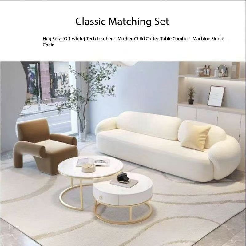 Fauteuil pistolet + canapé trois places + table basse