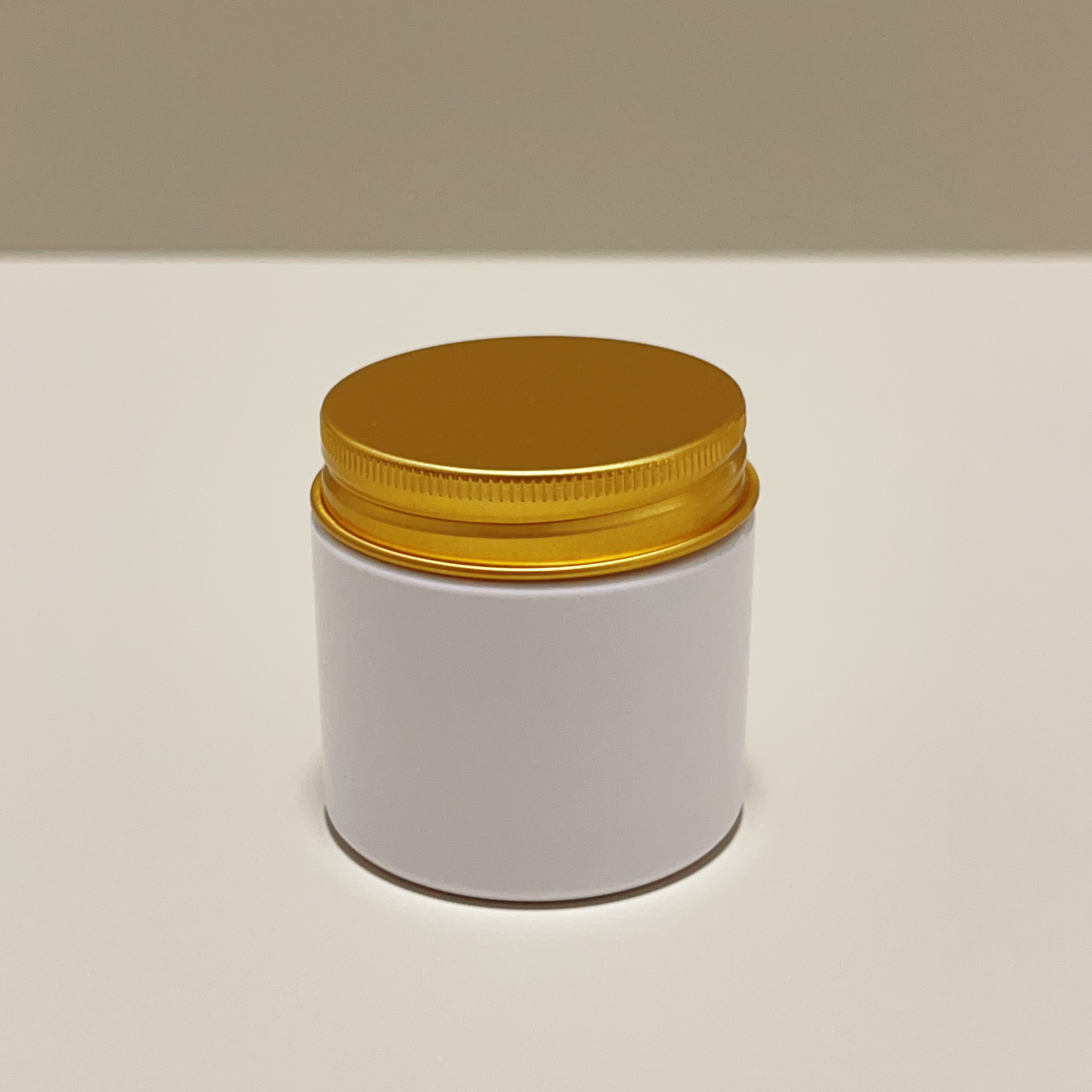 White Jar with Golden Aluminum Lid