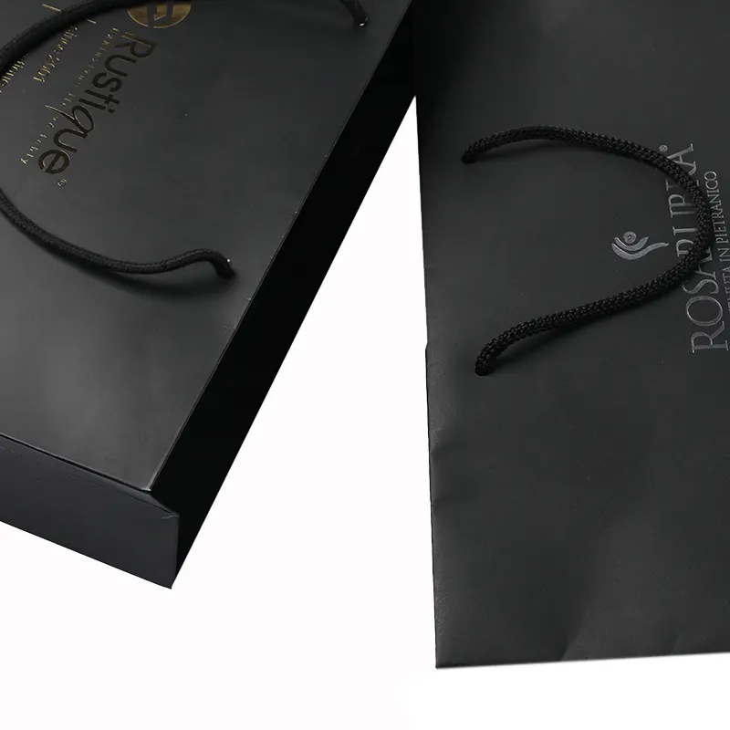 Wholesale Custom Printed Brand Logo Design Black Luxury Cosmetic Gift Shopping Paper Bag With Ribbon Handles