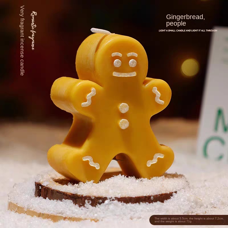 Bougie bonhomme en pain d'épices OrangeH en boîte