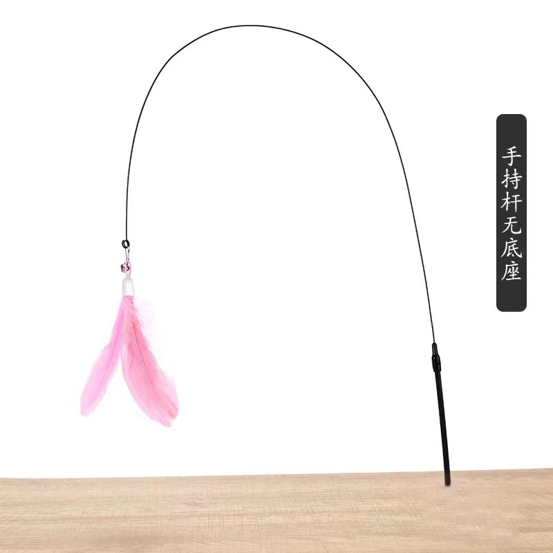 Bâton à main avec tête en plumes roses