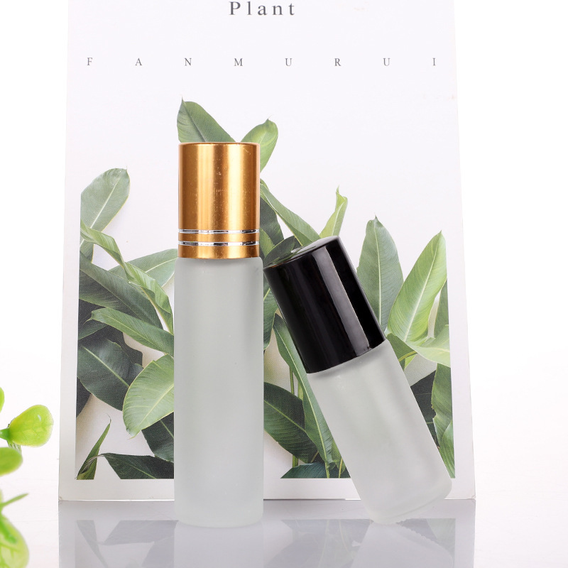 Transparent bottle + electroplated aluminum gold cap