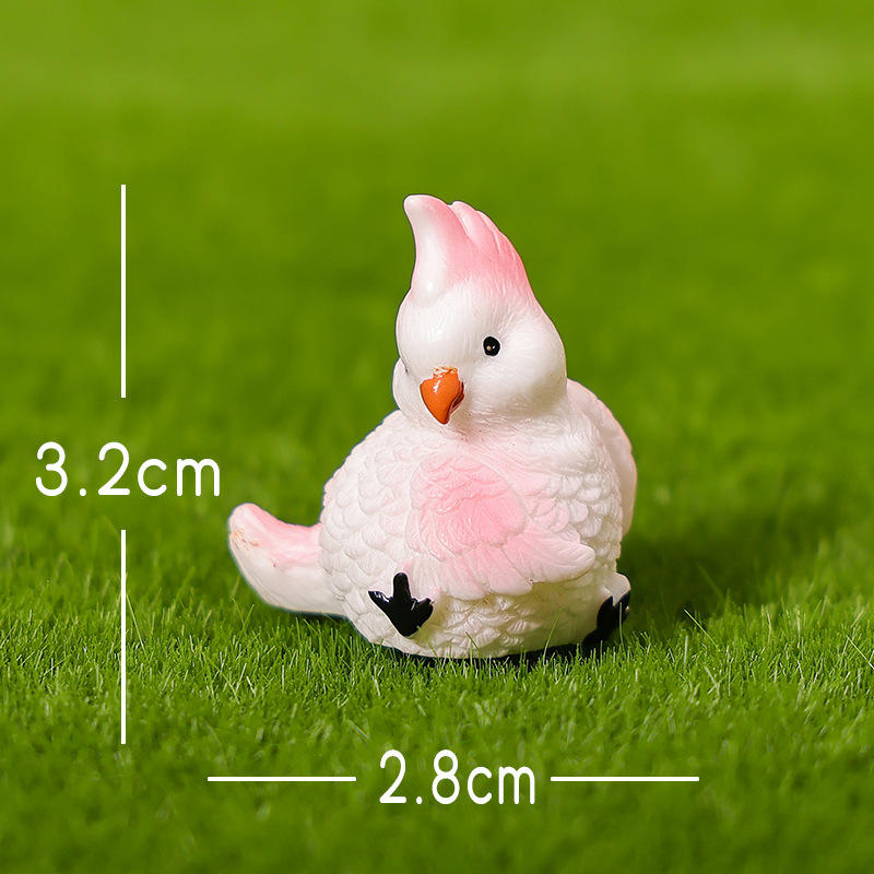 Oiseau de toilettage blanc