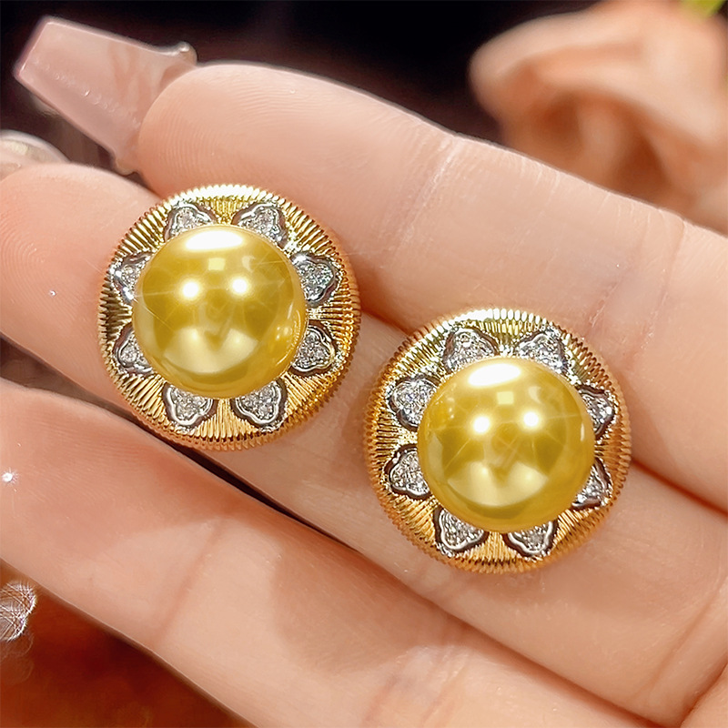 Boucles d'oreilles boules dorées