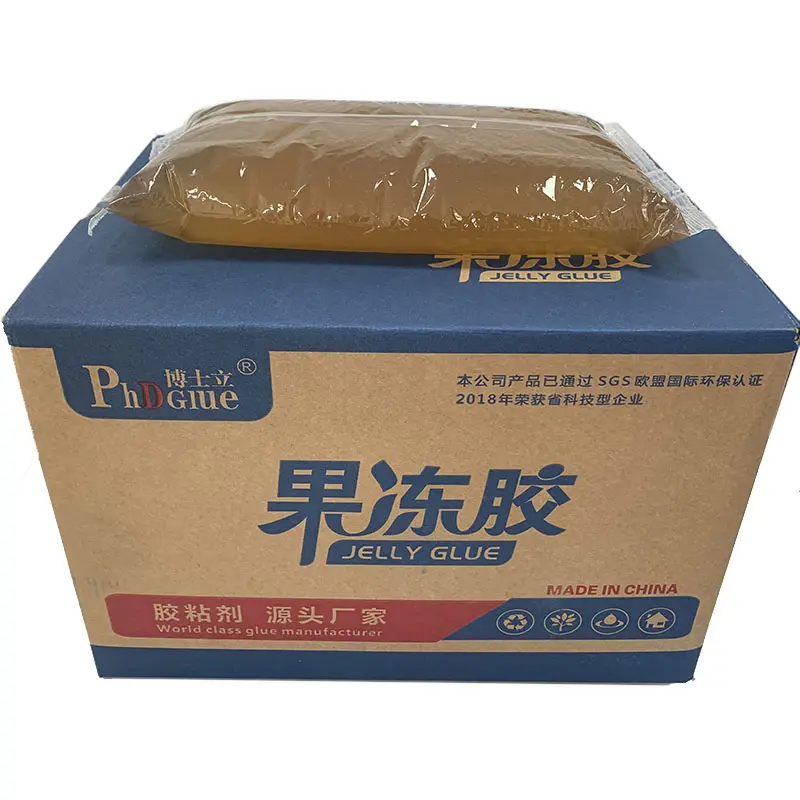 Emballage rigide Non toxique à haute viscosité d'usine, colle de gelée de protéines d'os d'animaux thermofusible pour manuel HF301