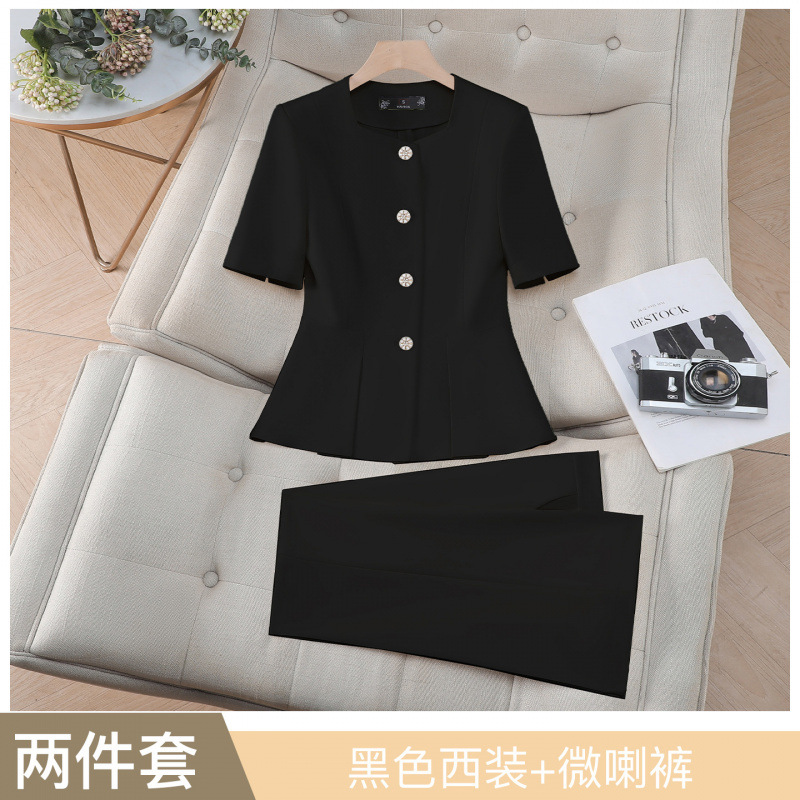 Black suit with slightly flared trousers