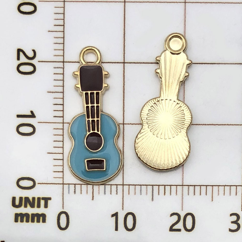 One lake blue oil-sprinkled guitar - 0.9g - 23*10mm - 19467